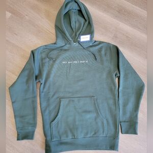 WeRateDogs "Tell Your Dog I Said Hi" Classic Hoodie in Alpine Green.